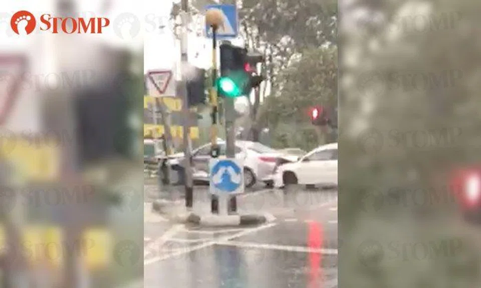Silver Cab taxi crashes into road sign, car rams into its back along Ayer Rajah Ave