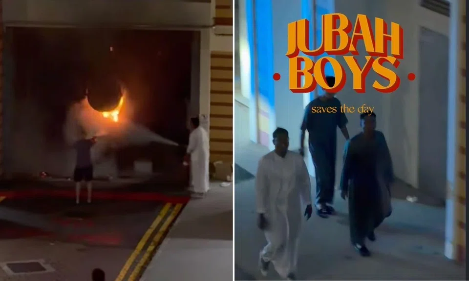 Joined by another man in shorts, they worked together to put out the fire.