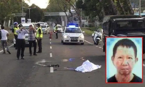 Policemen at the scene of the accident where Mr Lee Thien Yu (inset) was run over. PHOTOS: THE STAR