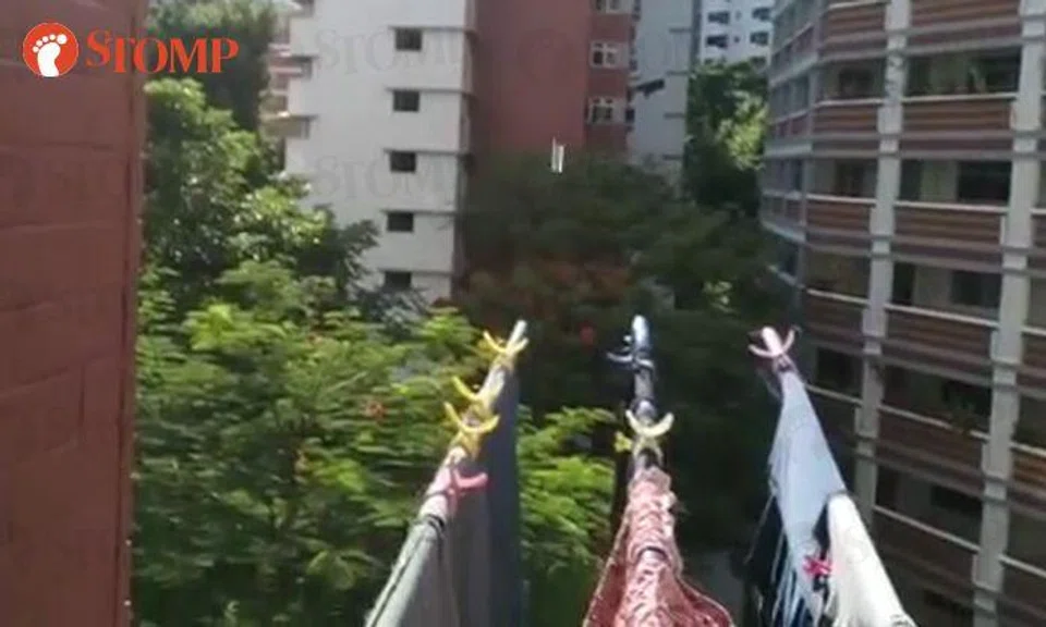 'Neighbours from the sea' hang wet laundry out to dry, drip water all over resident's clothes