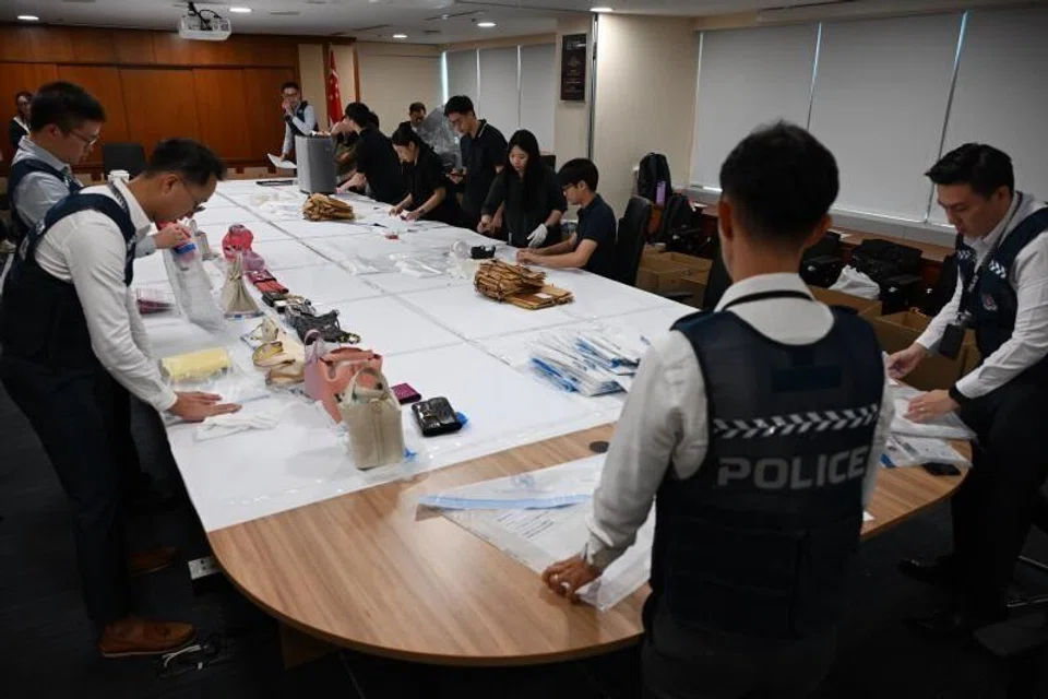 A total of 466 luxury items and 58 pieces of gold bars from the $3 billion money laundering case have been handed over by police to professional services firm Deloitte