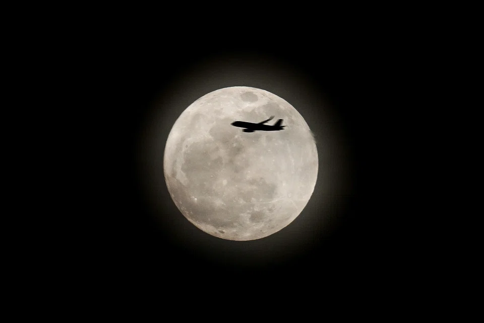 A supermoon as seen from East Coast Park in 2024. It occurs when a full moon coincides with the point in its orbit closest to Earth, making it appear larger and brighter than usual.