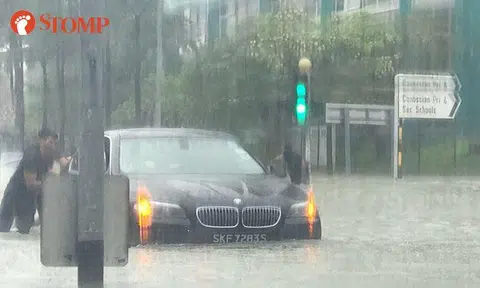 Vehicles stuck in flash floods that hit several parts of Singapore