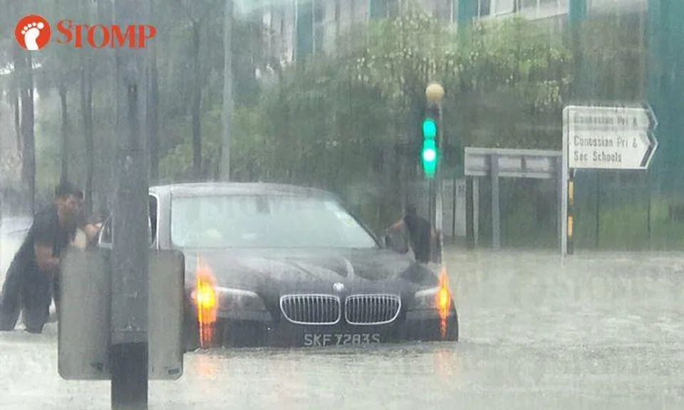 Vehicles stuck in flash floods that hit several parts of Singapore
