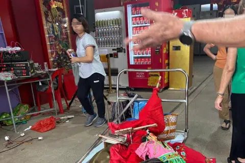 Disagreement leads to shoving, shouting between troupe members and temple officials