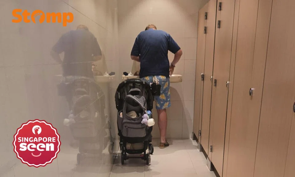 Man changes baby’s diaper in women’s toilet at Wheelock Place