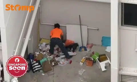 'Selfish': Yishun residents leave trash in corner on CNY eve, lone cleaner seen clearing it