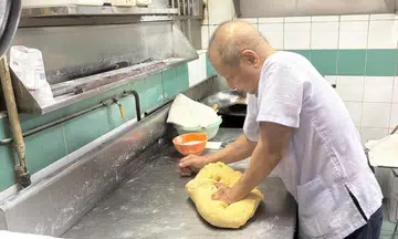Man kneading sachima
