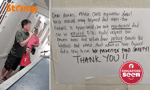 Volunteer taking photo of the Stomper's notice