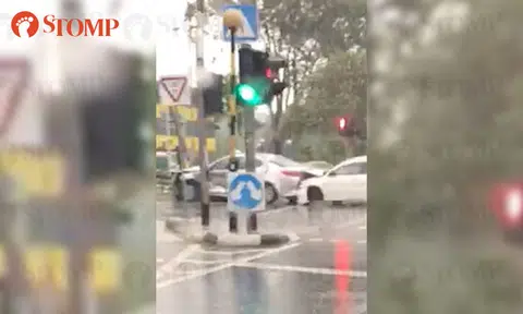 Silver Cab taxi crashes into road sign, car rams into its back along Ayer Rajah Ave