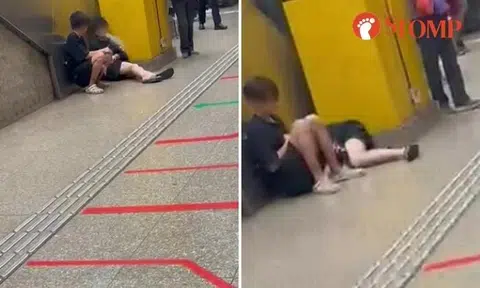 2 boys vape while sitting on Toa Payoh MRT platform, one curls up on floor next to friend
