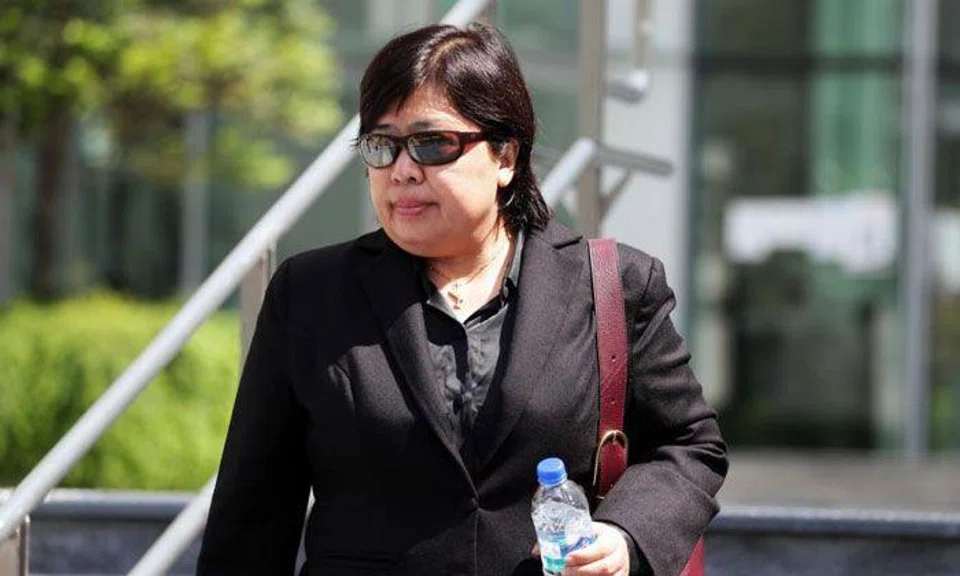 Phoon Chiu Yoke leaving the State Courts on May 24. She has been released on $8,000 bail. ST PHOTO: KELVIN CHNG