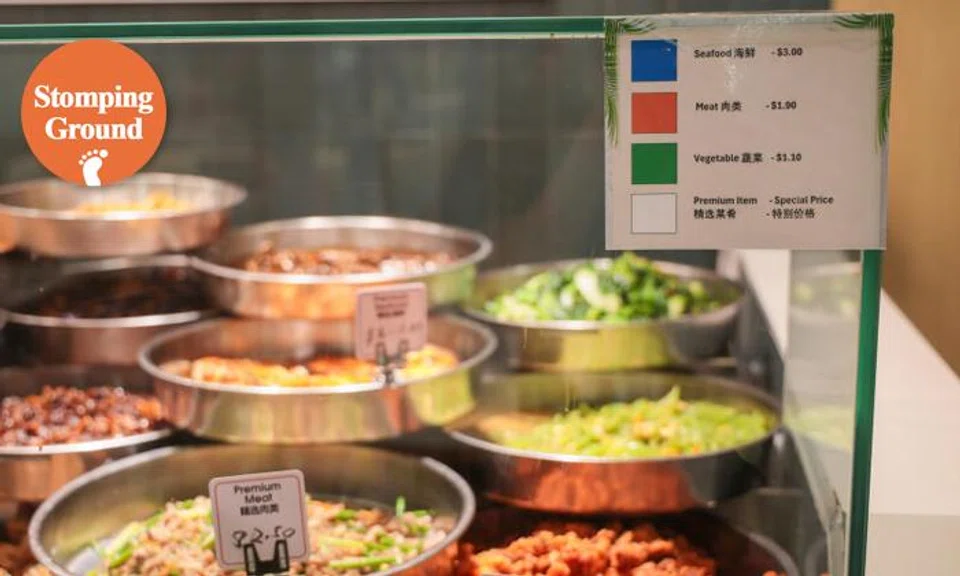 A colour-coded price label at a economy rice stall in a Cookhouse by Koufu food court in Velocity @ Novena Square, seen on May 30, 2025.