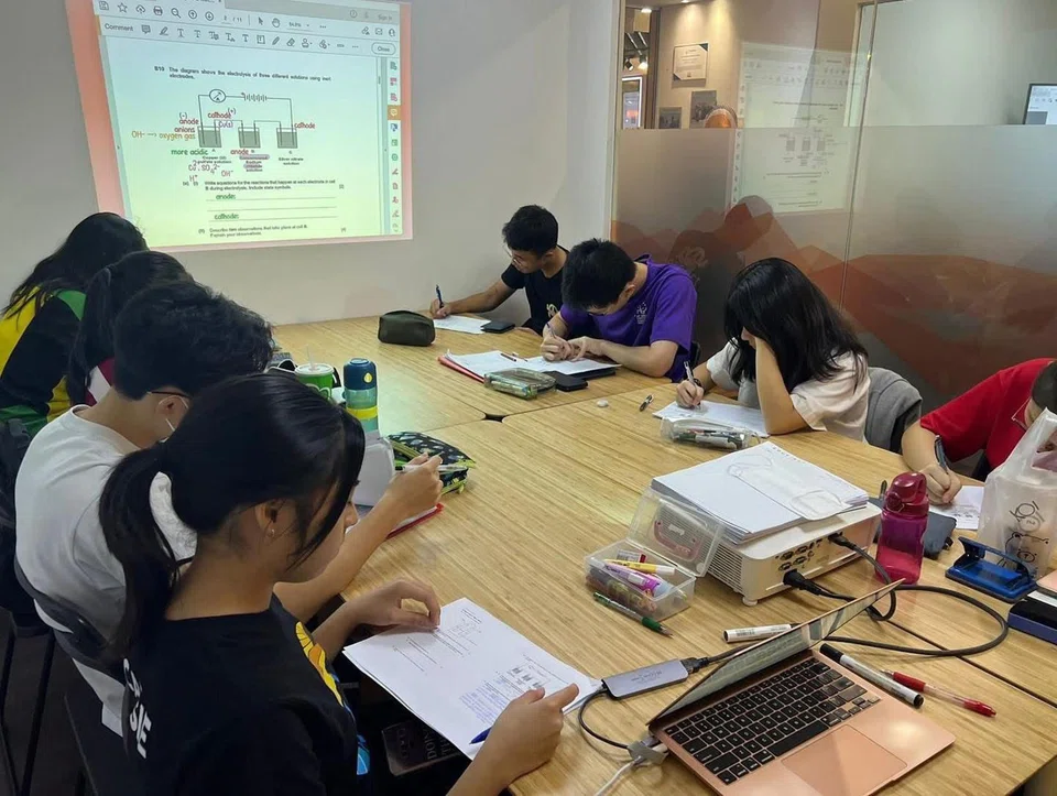 Secondary 4 students attending a chemistry class at EduFirst Learning Centre’s branch in Northpoint City in Yishun.