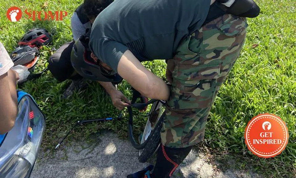 Kind cyclists to the rescue after 9-year-old girl suffers punctured bicycle tyre at Mandai Road