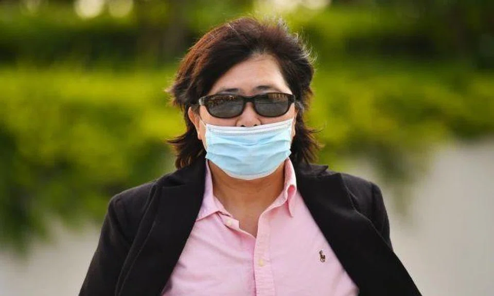'MBS badge lady' handed 14 new charges, facing 21 in total