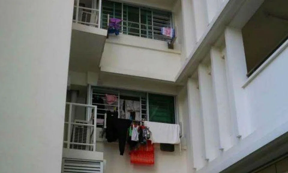 Woman dies after falling from Punggol flat