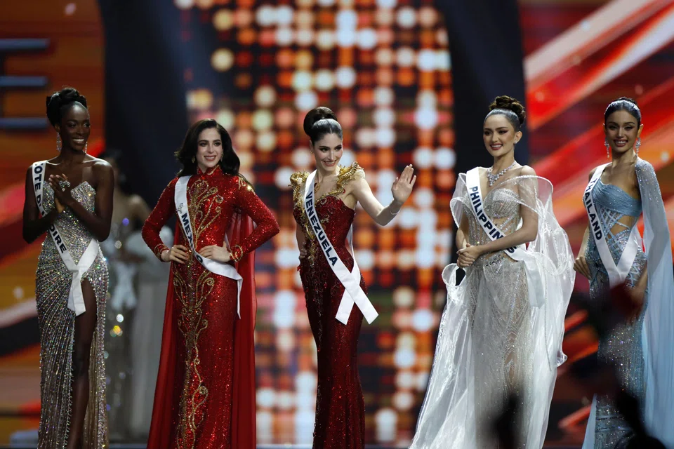(From left) The top five finalists – Miss Cote d’Ivoire, Miss Mexico, Miss Venezuela, Miss Philippines and Miss Thailand – at the 74th Miss Universe 2025 in Bangkok on Nov 21. PHOTO: EPA