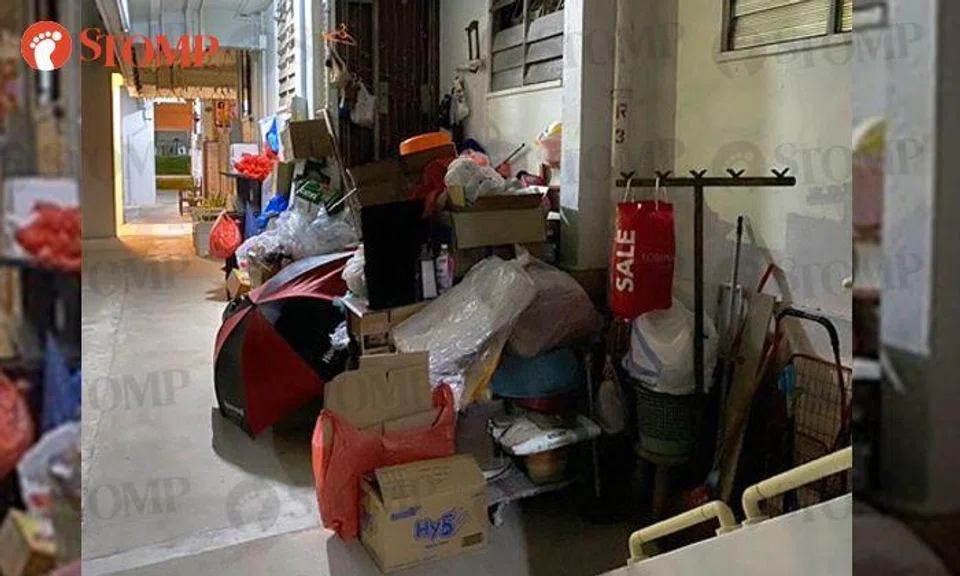 Cluttered Yishun corridor has been cleaned up 5 times in 2020, but situation remains 'challenging'