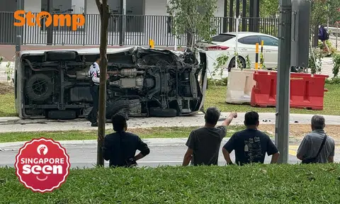Woman taken to hospital after van overturns in Bishan