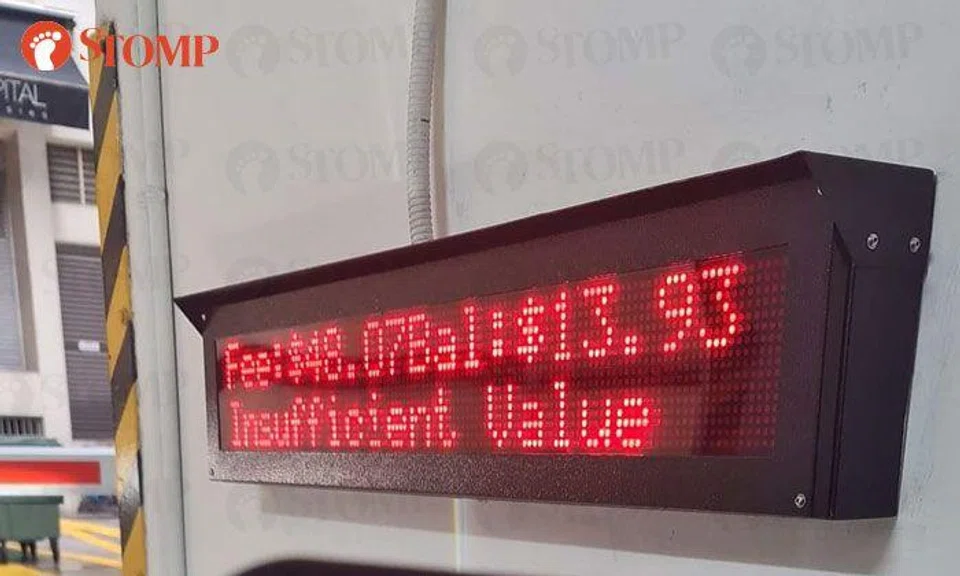 Motorcyclist shocked by $48.07 parking fee at One Raffles Place