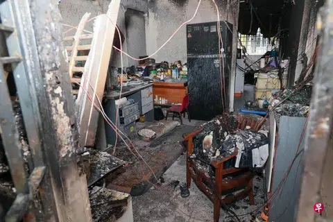 The fire spread from the second-floor unit to one above it, charring furniture and electrical wiring and leaving both homes in ruins.