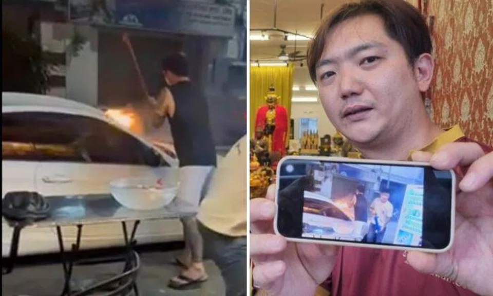 Lin Yufeng explained that the fire started from inside a locked BMW car that belonged to his business partner. Photo: Shin Min Daily News