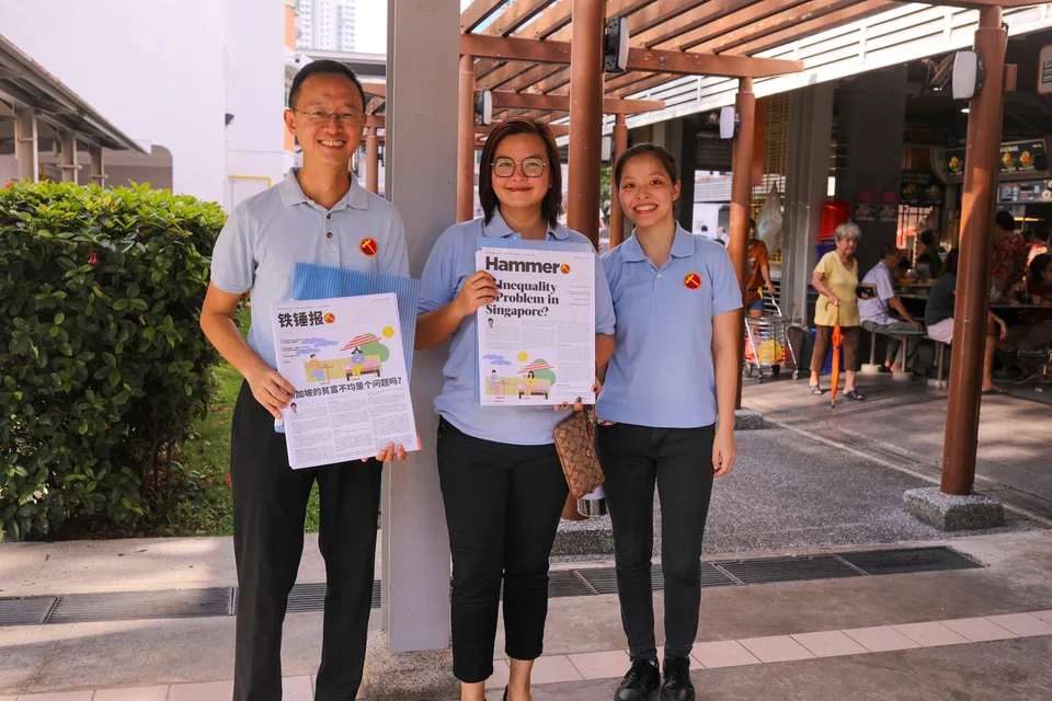 wkwp09 - Former Punggol East MP Lee Li Lian with Marine Parade candidate Nathaniel Koh selling the Workers' Party newsletter the Hammer in Jalan Besar in December 2024. Credit: WP