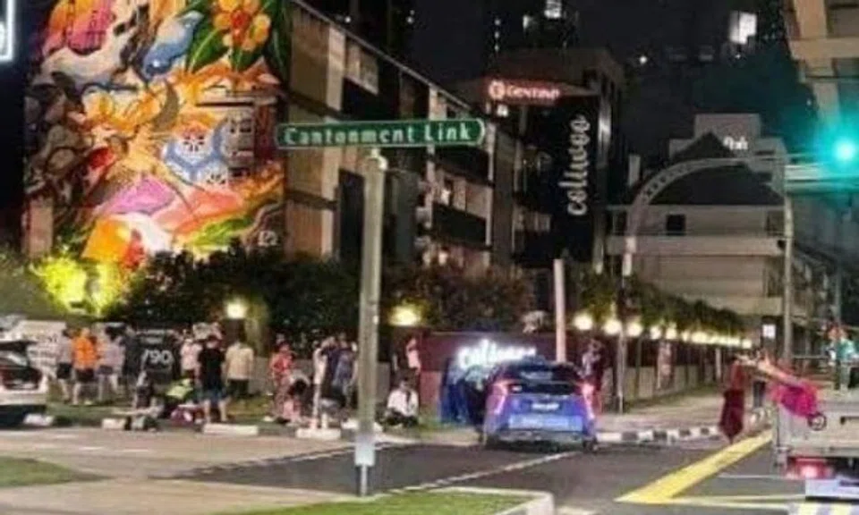 Photos on social media show a ComfortDelGro taxi and a white car near a traffic light at the scene, with a group of pedestrians standing on the pavement. Photo: Seah Yong Kok Francis/Facebook