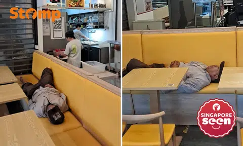 Sleeping man sprawls across restaurant seats at China Square Food Centre -- until the next day