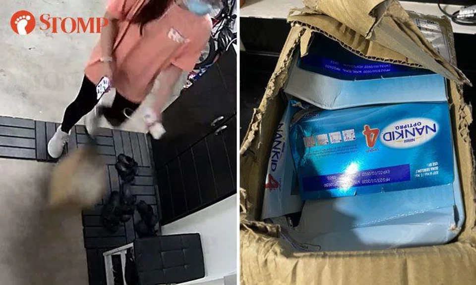 Delivery woman tosses box containing baby milk powder in front of customer's unit, damages packaging