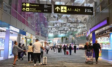 hong kong mother bites sg police officer after son kicks her and assaults bystander at changi airport