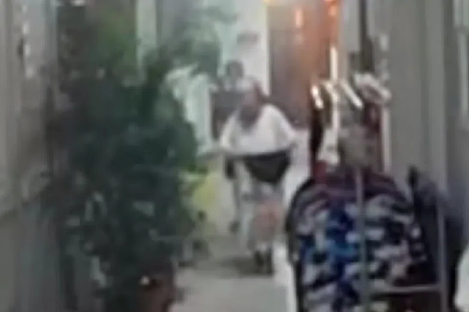 The woman danced, waving her underwear, towards her neighbours' units as a 'protest'. 