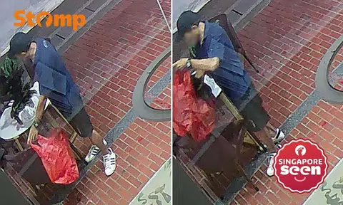 Man takes plant from outside Marine Parade TCM clinic