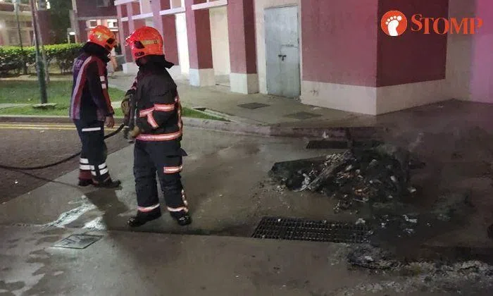 Tampines residents extinguish bin fire with buckets of water | STOMP