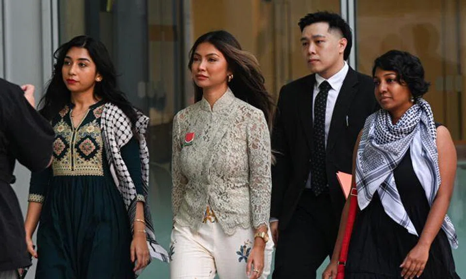 (From left) Siti Amirah Mohamed Asrori, Annamalai Kokila Parvathi and Mossammad Sobikun Nahar were charged over their alleged involvement in organising a procession without a permit on Feb 2, along the perimeter of the Istana. PHOTO: ST FILE