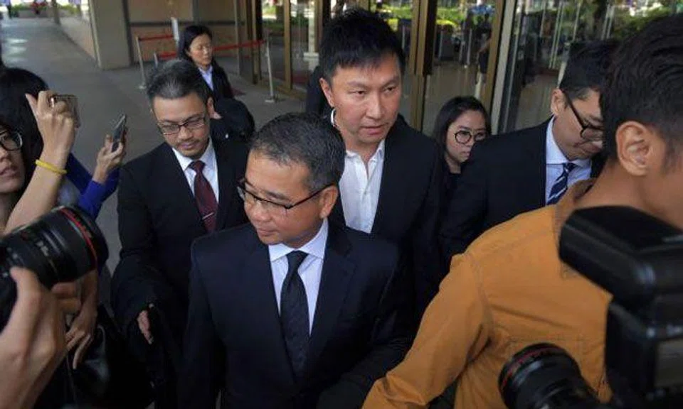 City Harvest Church (CHC) founder and senior pastor Kong Hee (centre) leaving the Supreme Court last Friday with his lawyer, Mr Edwin Tong, in front of him. Kong has said through his lawyer that he will study the filing by the Attorney-General's Chambers carefully before considering the next move. Photo: ST