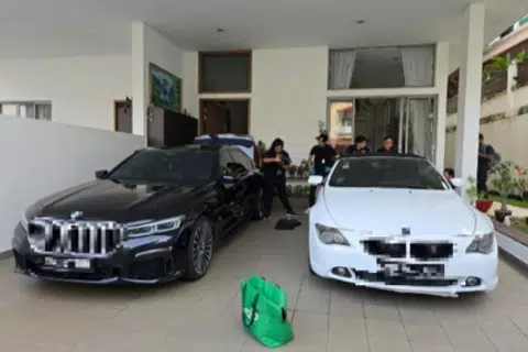 Luxury cars, watches among assets seized in anti-vice bust; 28 nabbed