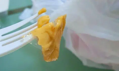 Photos of the small piece of plastic covered in nacho cheese were posted on Facebook.