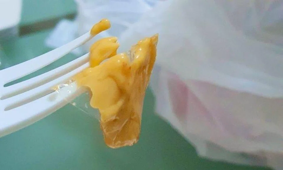 Photos of the small piece of plastic covered in nacho cheese were posted on Facebook.