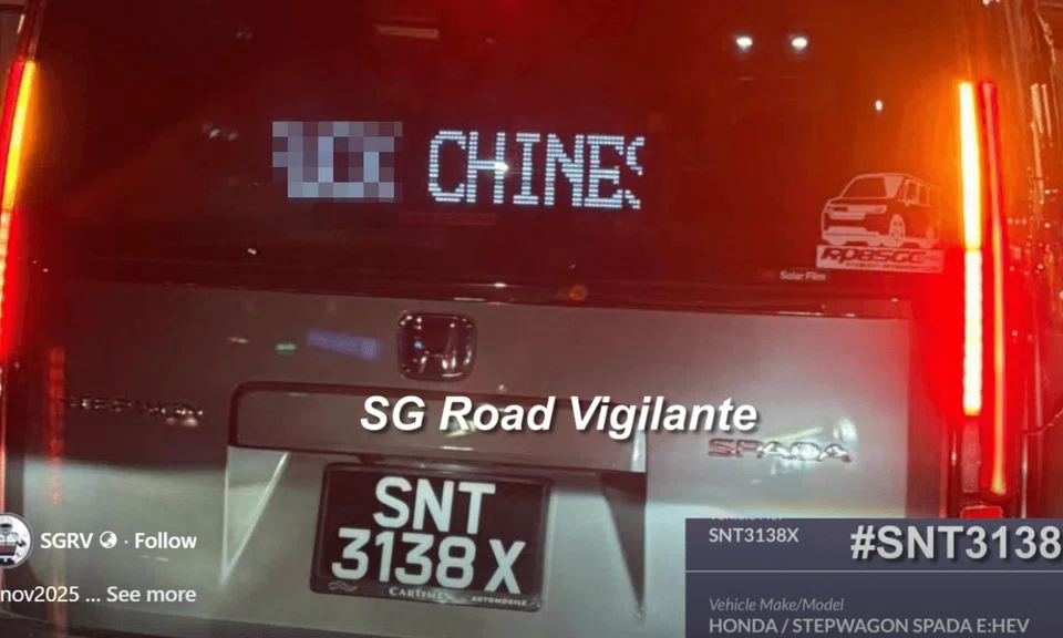 car showing expletive on rear window