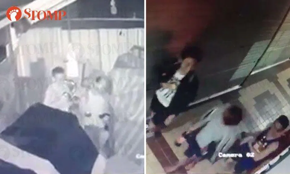 Group of youths take bottled drinks from closed mini-mart at Tampines St 44
