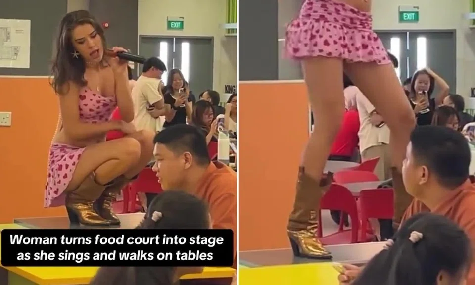 Woman in revealing clothes singing in foodcourt raises concern about her boots dirtying tabletops