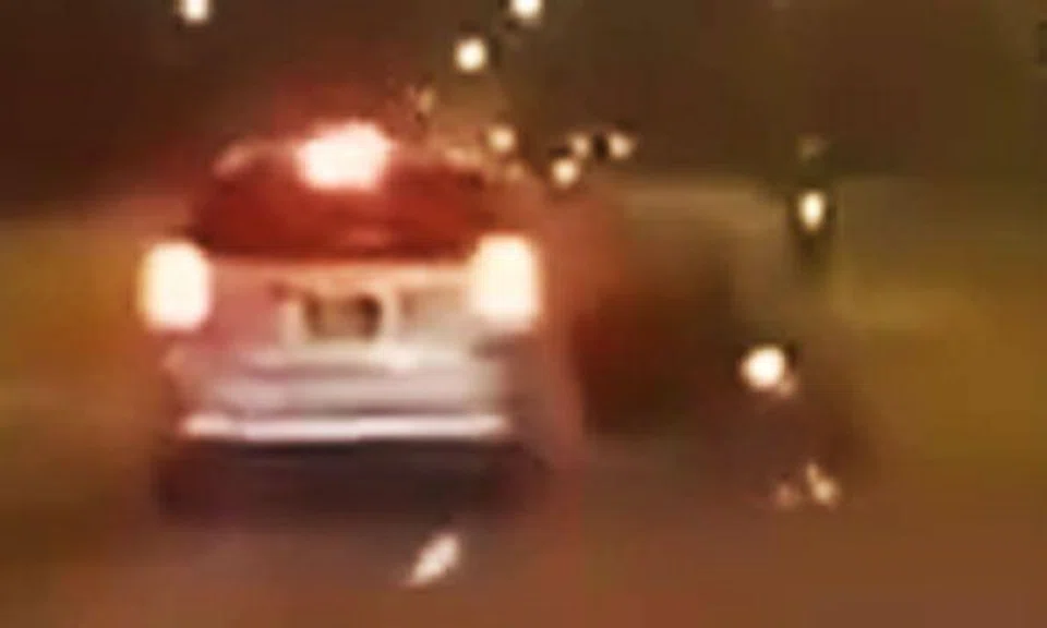 Driver knocks rider off his bike while changing lanes on SLE