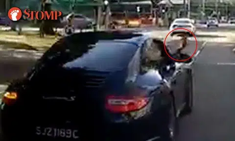  Porsche driver shows motorist middle finger -- then plays 'braking game' along River Valley Road
