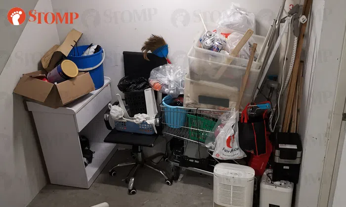 Town council removes bulky items cluttered at staircase landing of ...