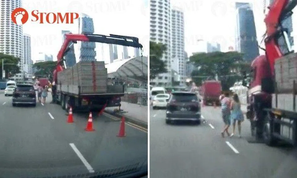 Car side mirror hits arm of pedestrian walking on road, driver berates ...