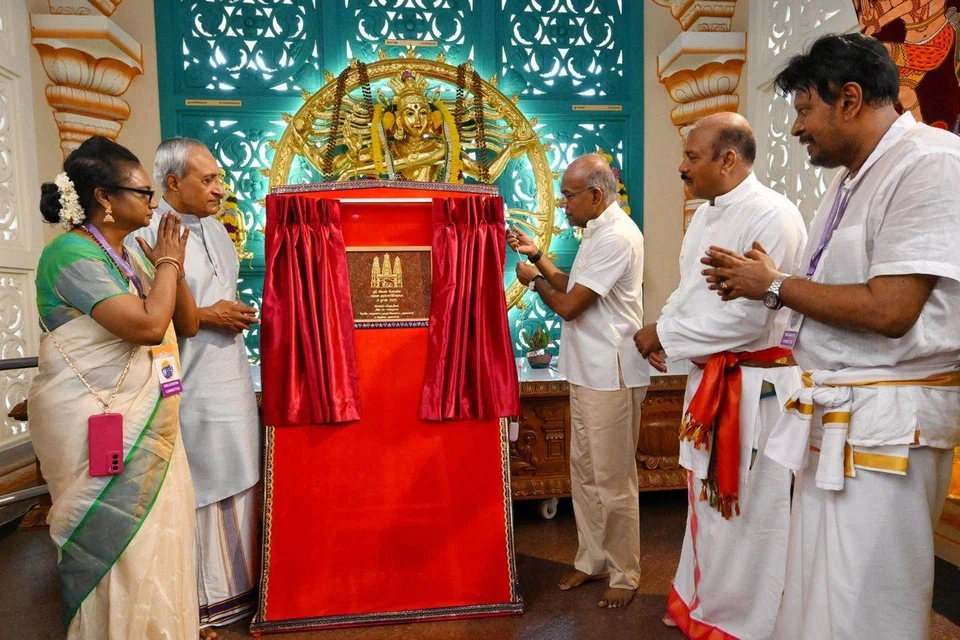 Coordinating Minister for National Security and Minister for Home Affairs K. Shanmugam (third from right) at the consecration of the Sri Sivan Temple on June 8.