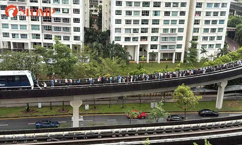 Commuters walk on tracks after Sengkang-Punggol LRT breaks down for 2nd time in 3 days