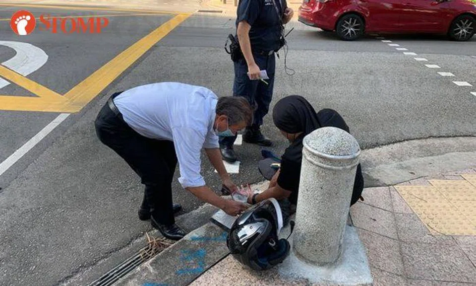 Motorcyclist sent flying after getting hit by car at North Bridge Road